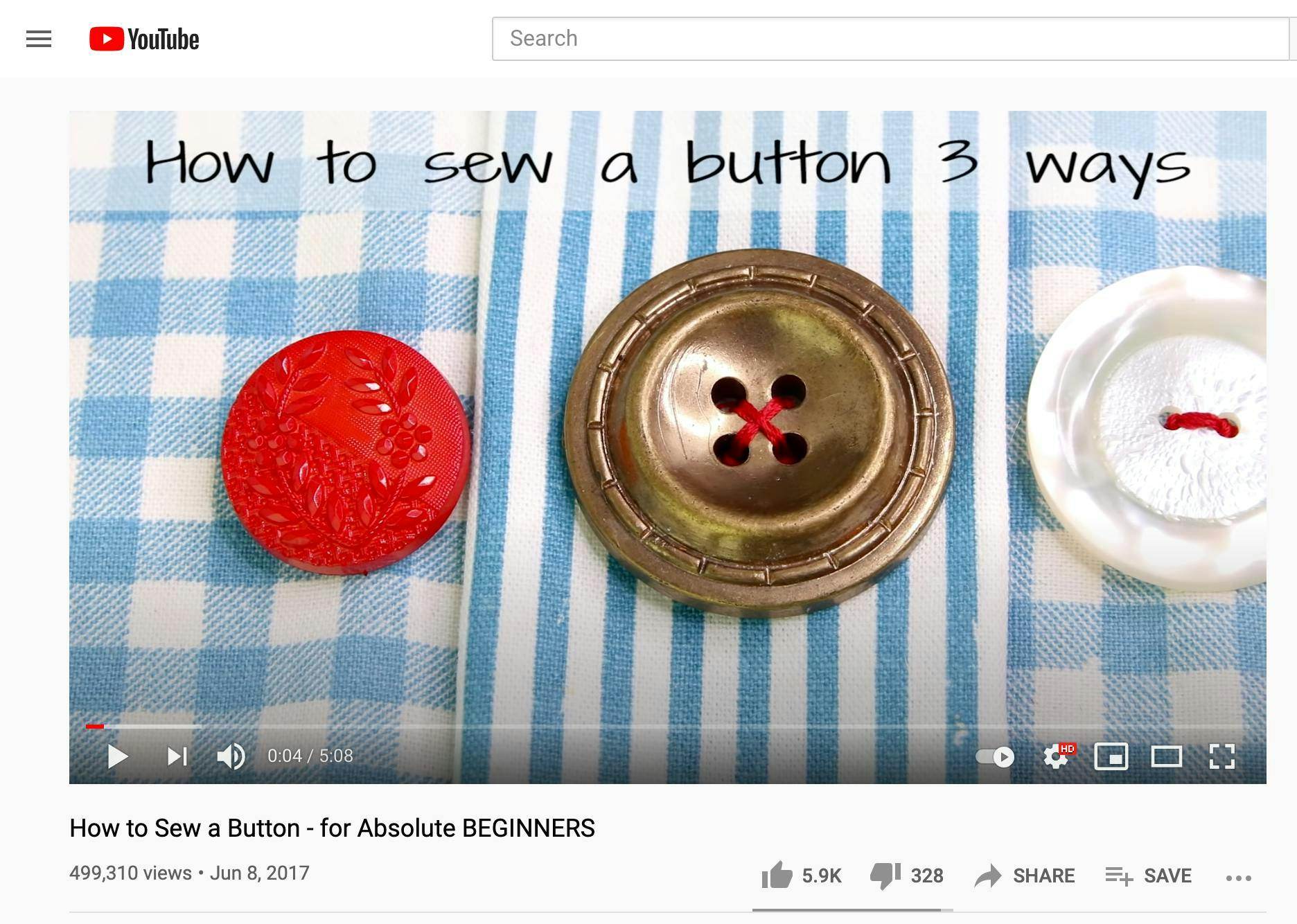 Capture d'écran d'une vidéo YouTube sur comment coudre un bouton 