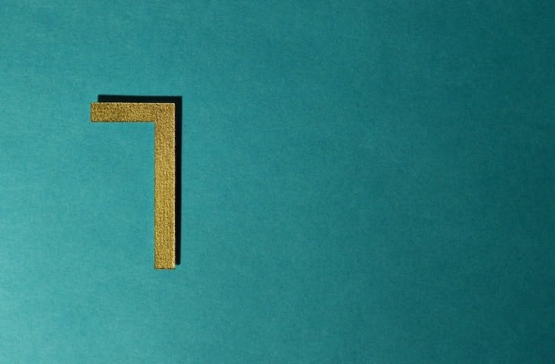 The number seven is displayed on a turquoise background