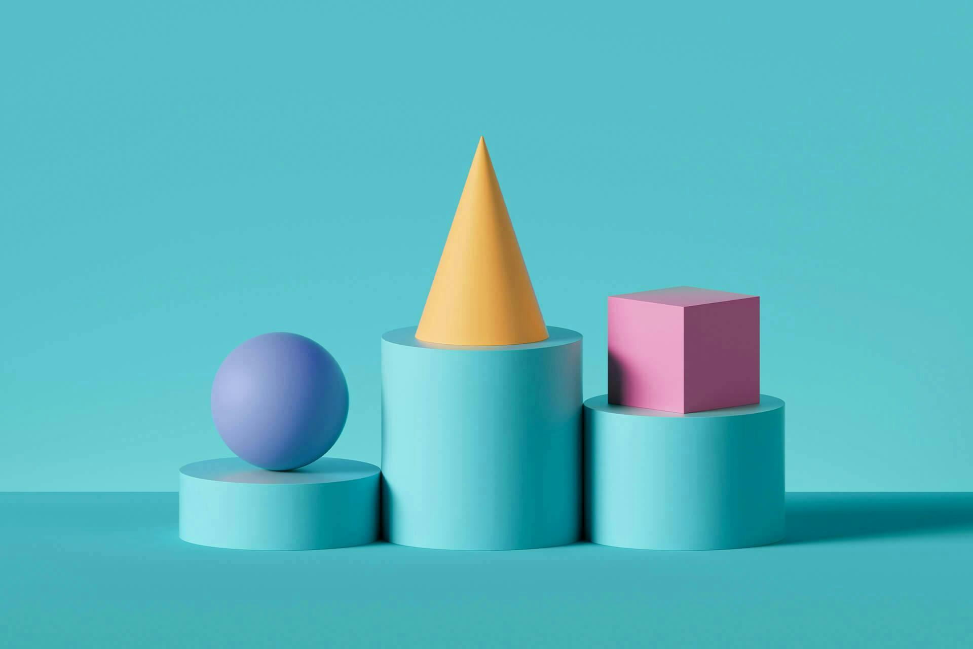 un podium en forme cylindrique sur lequel sont disposés respectivement une sphère bleue, un cube rose et un cône jaune.