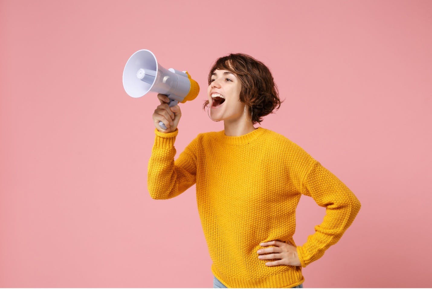 Customer shouting in a megaphone. The fifth of the six types of customers is the Loyal Customer.