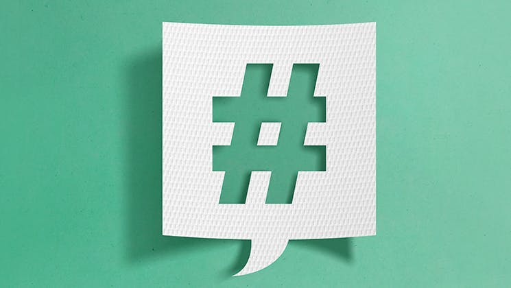 Hashtag symbol on green background. Implement hashtag search for your Instagram marketing
