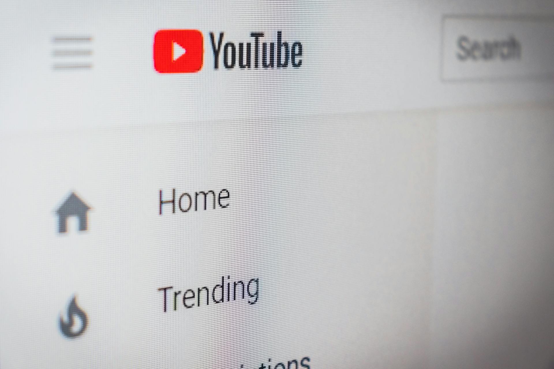 Close up view of YouTube home page showing Trending button.