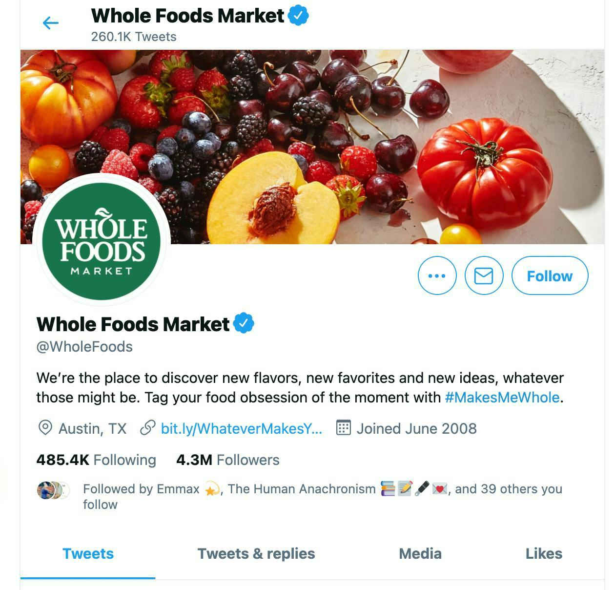 Twitter profile of Whole Foods, showing a branded hashtag in the bio