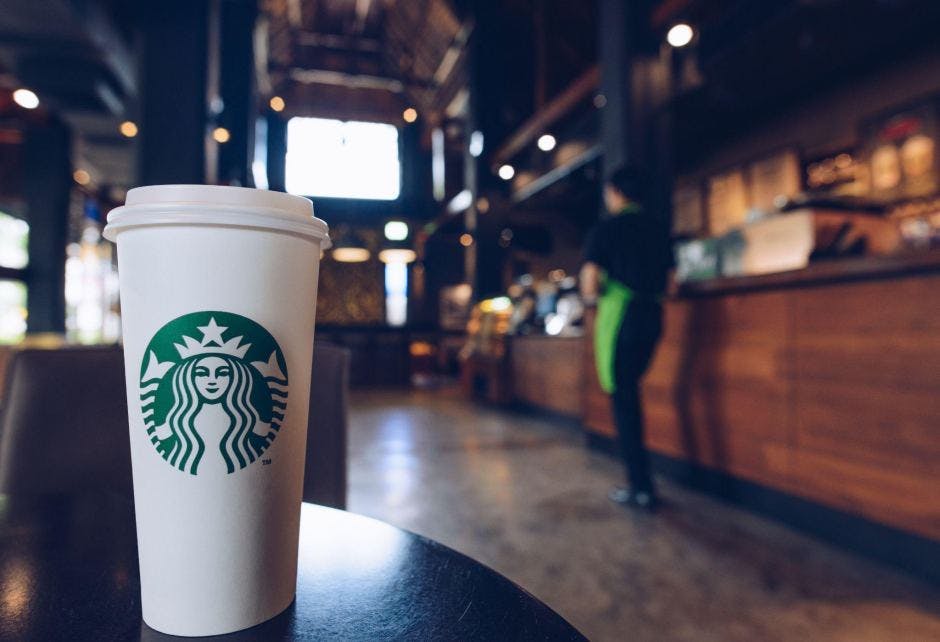 Starbucks' logo on a cup