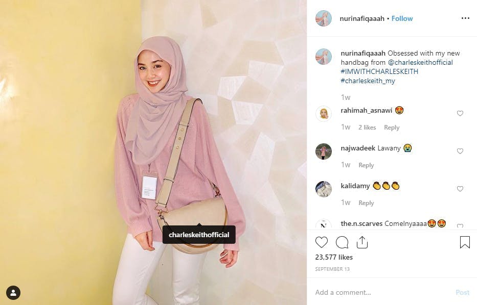 Influencer modeling bag on instagram post