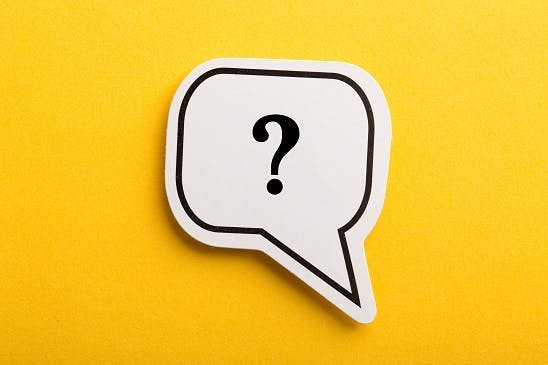 Logo of a question mark in a speech bubble on yellow background