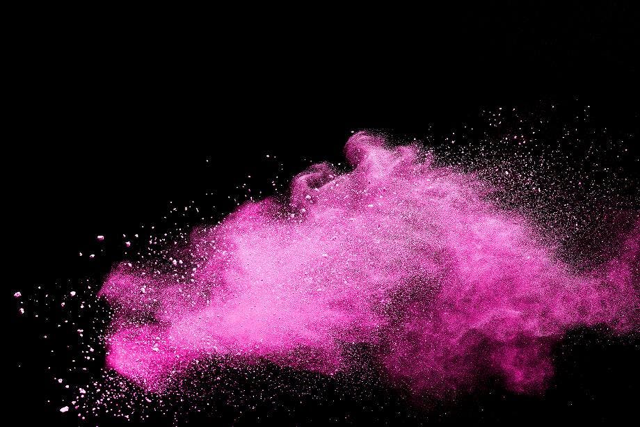 Pink dust on a black background